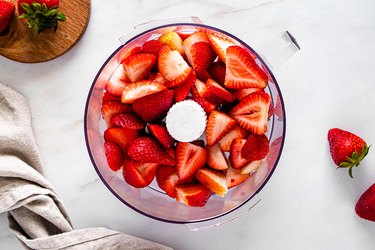 Cut strawberries in a food processor