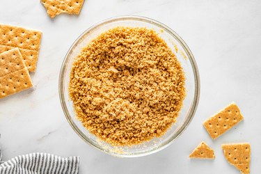 Graham cracker crumbs and melted butter