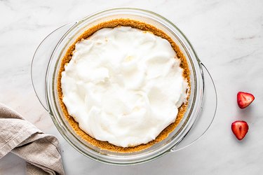 Add meringue to top of hot pie