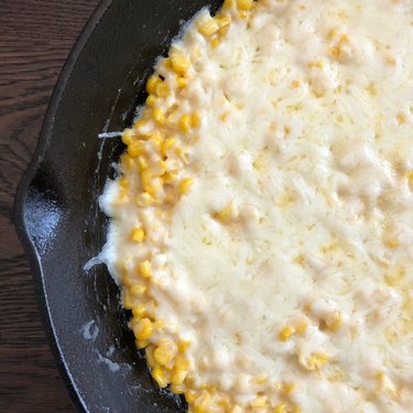 cheesy corn in a skillet