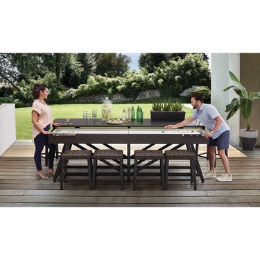 Dining room table that converts into a shuffleboard