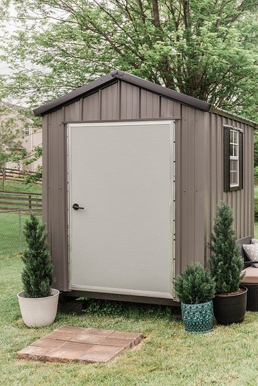 Add a concrete block pad out front to give your shed more of an inviting feel.