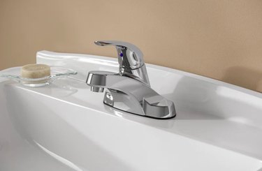 Pfister bathroom faucet on a white sink