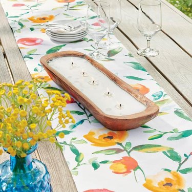 citronella candle on outdoor table