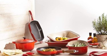 A group of red cookware