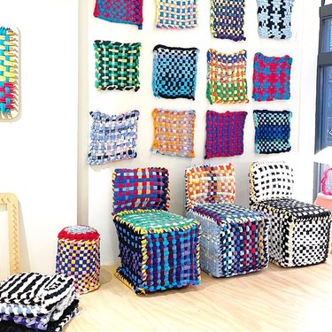 t-shirt waste loom chairs and fabric on wall