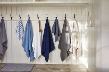 blue and neutral towels hanging