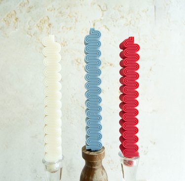 Sculptos wave candle in red, white, and blue