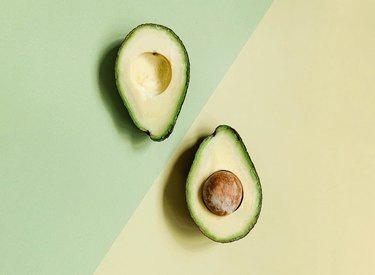 avocado on green diagonal background