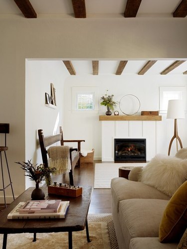 Farmhouse living room with board and batten fireplace.