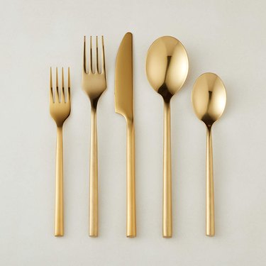 CB2 20-Piece Brushed Gold Flatware Set