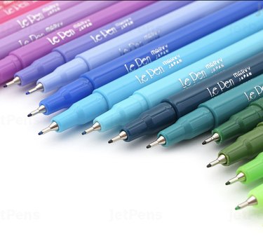 uncapped colored pens
