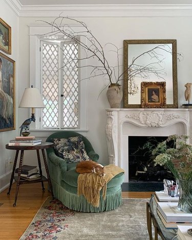 French country living room with green chaise lounge