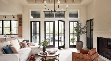 French country living room with French doors leading to patio