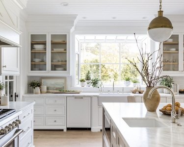 white kitchen with pendant light