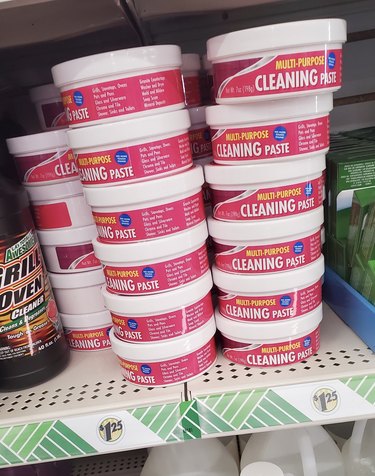 Tubs of the multi-purpose cleaning paste on the shelf in Dollar Tree.