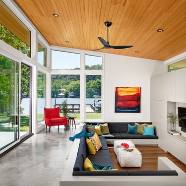 modern  water-adjacent home with wood clad walls