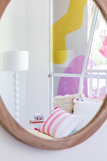 mirror on windows with colorful vinyl