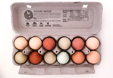 egg carton with different colored eggs