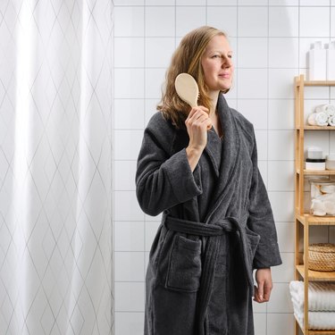 woman in gray bathrobe