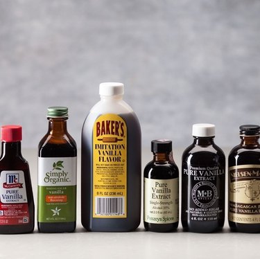 Bottles of vanilla extract on a table