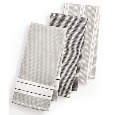 Gray dish towels with subtle stripe designs, each a little different
