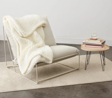 white blanket on chair