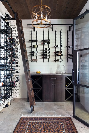 Wine cellar with racks and wood sideboard