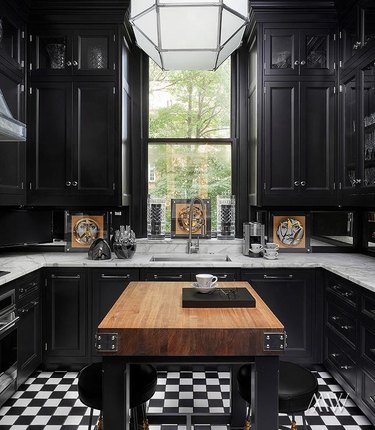 petite kitchen with small scale black and white floors