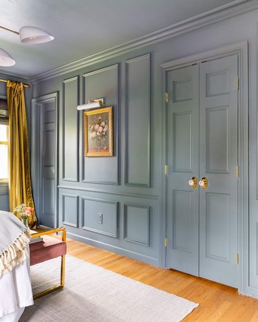 A room painted entirely a blue gray color.
