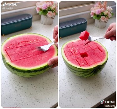 Using a fork slicer to cut a watermelon