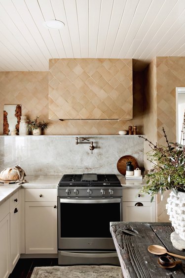white kitchen color scheme with tan wall tile