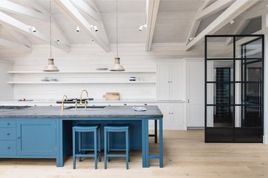 white kitchen color scheme with teal island