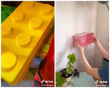 On the left is a giant yellow LEGO box. On the right, the creator is leveling the now pink LEGO box on their living room wall.