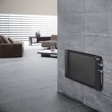 A micathermic panel heater in a gray living area
