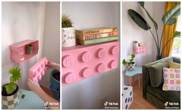 First image is the creator putting objects in the open LEGO shelf on the wall. The second image is the close up of the pink LEGO shelf topped with a plant and books. The third image is the pink LEGO shelf in their living room with a green couch and big plant.