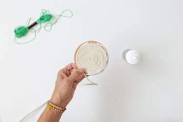 Secure rope coil to cork coaster with glue