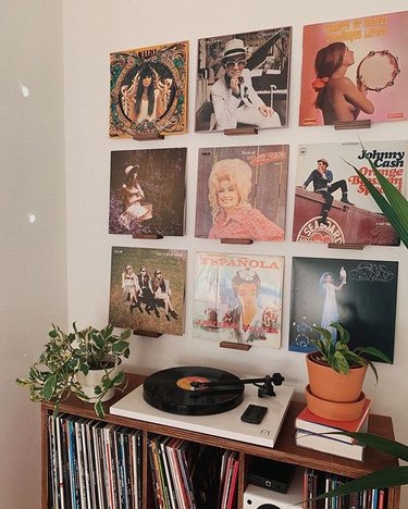 Wall covered with vinyl records.