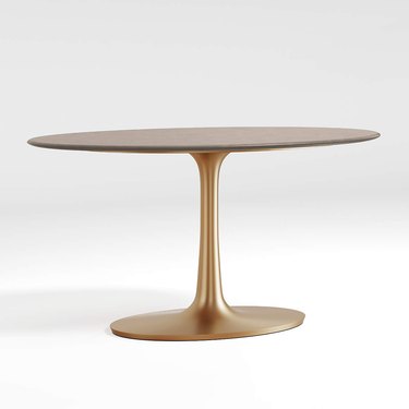 Crate & Barrel Nero Oval Concrete Dining Table with Brass Base