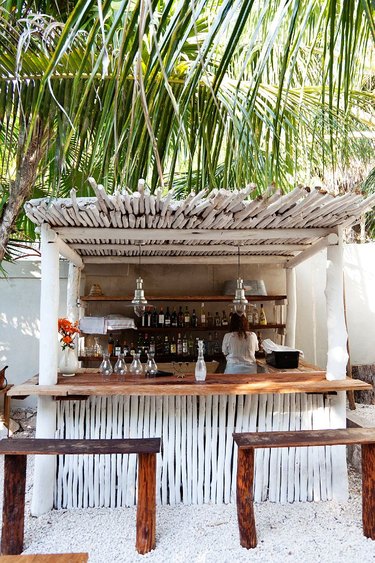 White tiki bar by the beach.