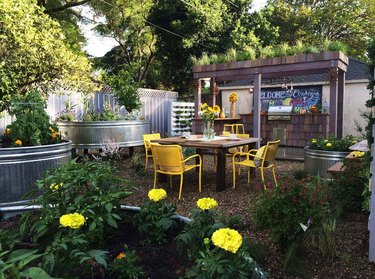 Outdoor dining space in a garden.