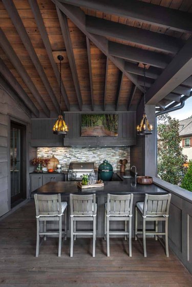 Rustic outdoor bar with gray and silver accents.