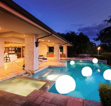 Pool with floating globe lights