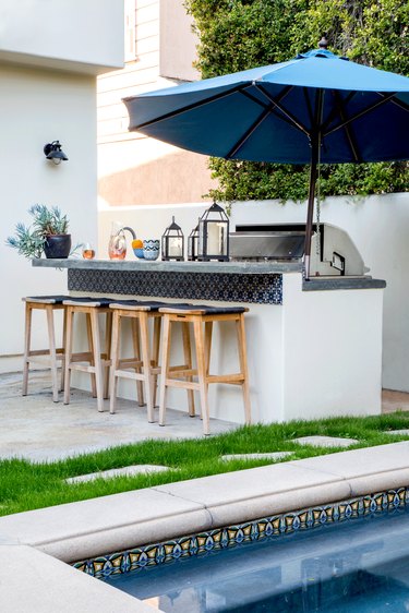 outdoor bar with blue parasol for shade