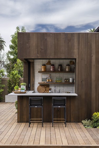 modern backyard bar idea with open shelving