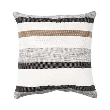 A striped brown and cream pillow.