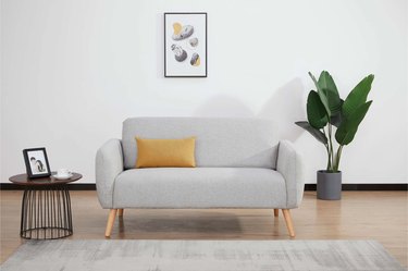 Wayfair gray loveseat with round arms in living room