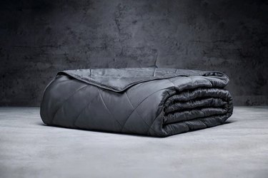 A folded black blanket