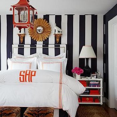 bedroom with black and white vertical striped walls