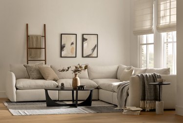neutral living room with sectional sofa